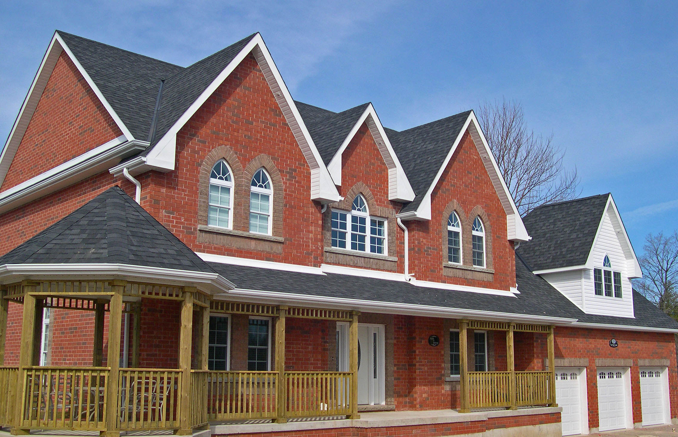 Traditional style red brick new custom home build in Halton Hills by Tindale Custom Build